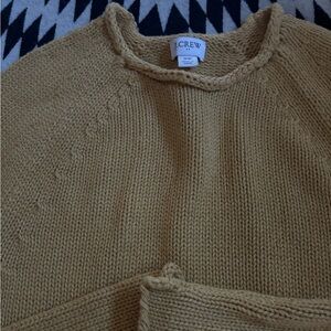 Sweater.  New w/o tags.  Never worn.  Mustard color.